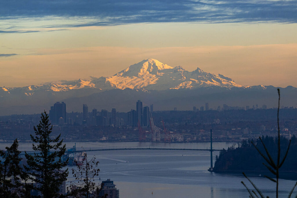 Mount Baker in the distance framed by the soft colors of dusk.